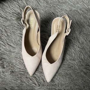Pointed slingback high heels
